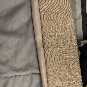 Silver clutch bag with strap